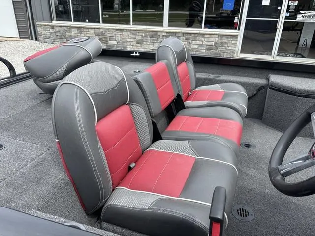 Slide: The Image of 2018 Ranger RT178 boat interior with red and gray seating, showcasing modern design and comfort. - 5