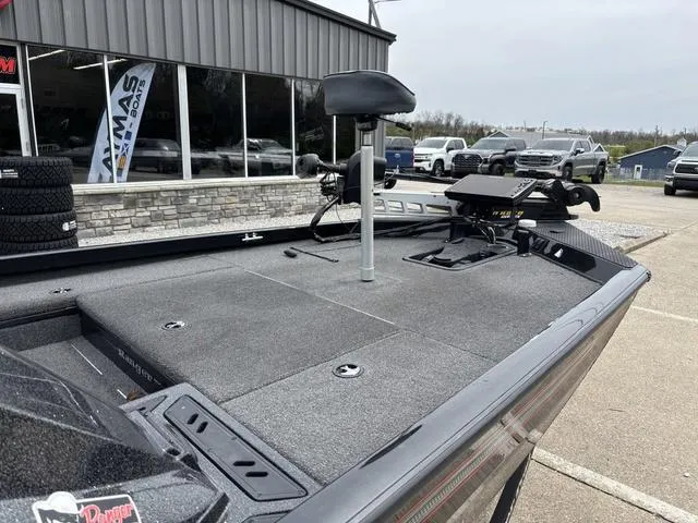 Slide: The Image of 2018 Ranger RT178 fishing boat with trolling motor and seat, parked outside dealership. - 6