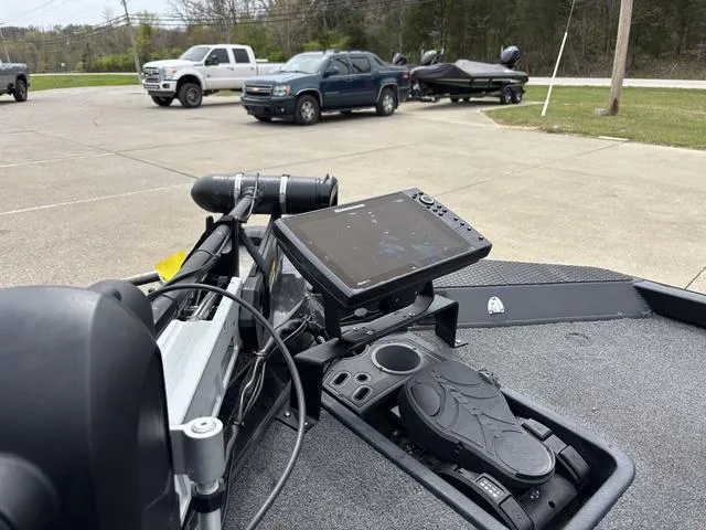 Slide: The Image of 2018 Ranger RT178 boat with advanced navigation system in a parking lot. - 9