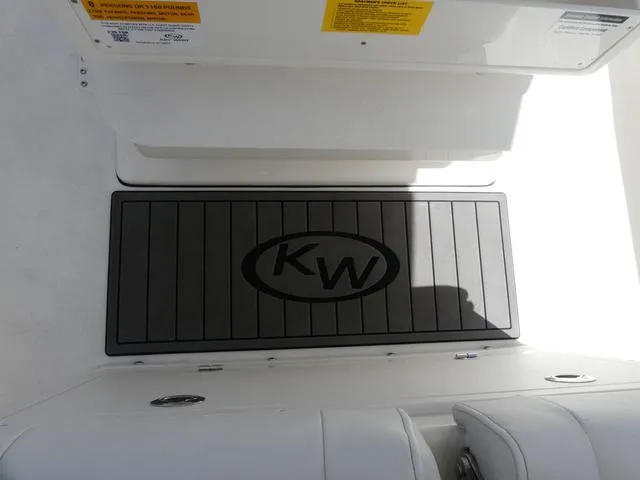 Slide: The Image of 2025 Key West 239 FSR boat deck with KW logo mat. - 19