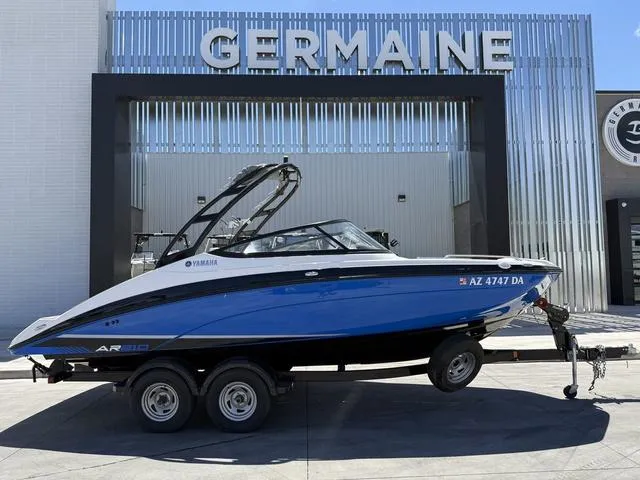 Slide: The Image of 2017 Yamaha AR210 boat on trailer at Germaine dealership. - 1