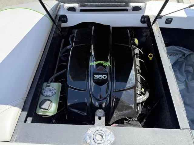 Slide: The Image of 2016 Sanger 215S boat engine compartment with a 360 horsepower engine. - 12