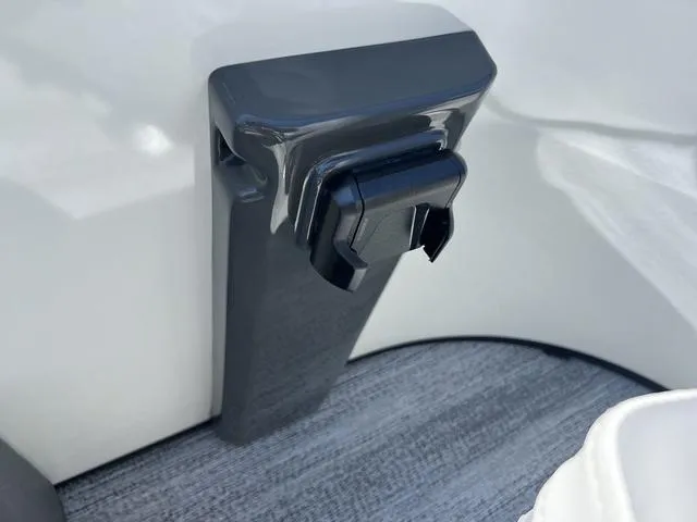 Slide: The Image of Close-up of a 2025 Bennington 22 SSR PTG boat component on a gray deck. - 12