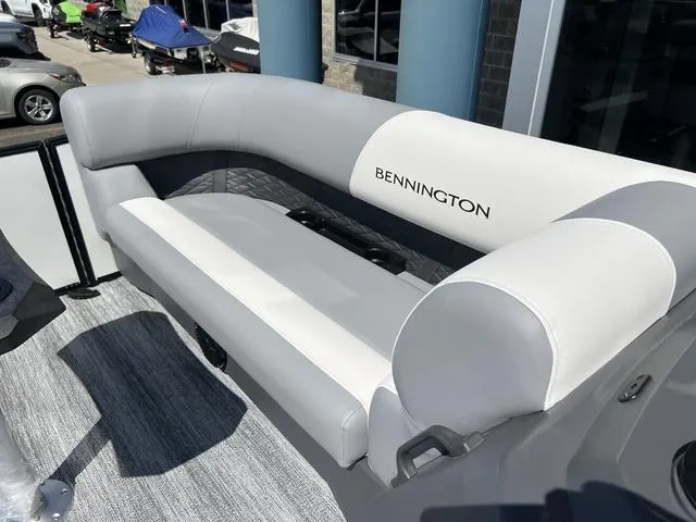 Slide: The Image of 2025 Bennington 22 SSR PTG boat with luxurious seating and sleek design. - 14