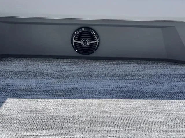 Slide: The Image of 2025 Bennington 22 SSR PTG boat interior with speaker and textured flooring. - 32