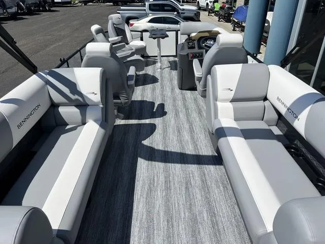Slide: The Image of 2025 Bennington 22 SSR PTG pontoon boat interior with plush seating and modern design. - 34
