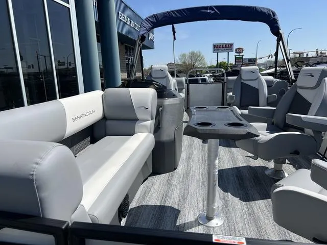 Slide: The Image of 2025 Bennington 22 SSR PTG pontoon boat interior with plush seating and modern design. - 39