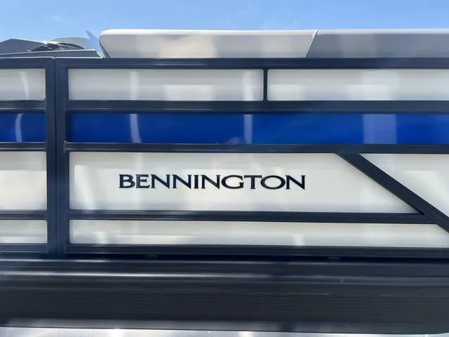 Slide: The Image of 2025 Bennington 22 SSR PTG boat with sleek design and blue accents. - 41