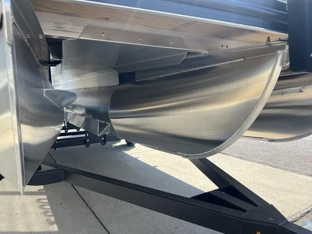 Slide: The Image of 2025 Bennington 22 SSR PTG pontoon boat underside on trailer. - 7