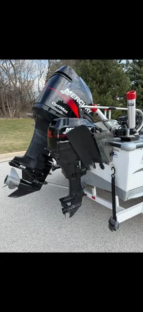 Slide: The Image of 2003 Lund 2025 Pro-V Magnum SE boat with Mercury outboard motor on trailer. - 8