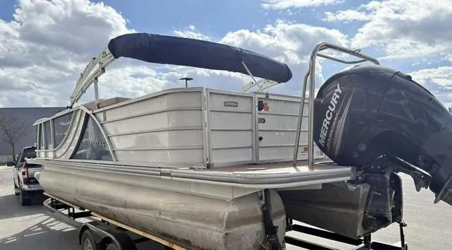 Slide: The Image of 2016 South Bay 523FCR 2.75 pontoon boat with Mercury outboard motor on trailer. - 4