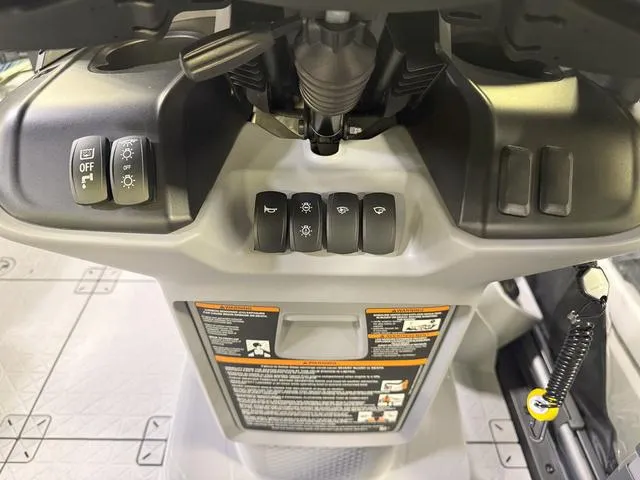 Slide: The Image of Control panel of 2025 Sea-Doo Switch™ Fish 18, featuring various switches and instructions. - 10