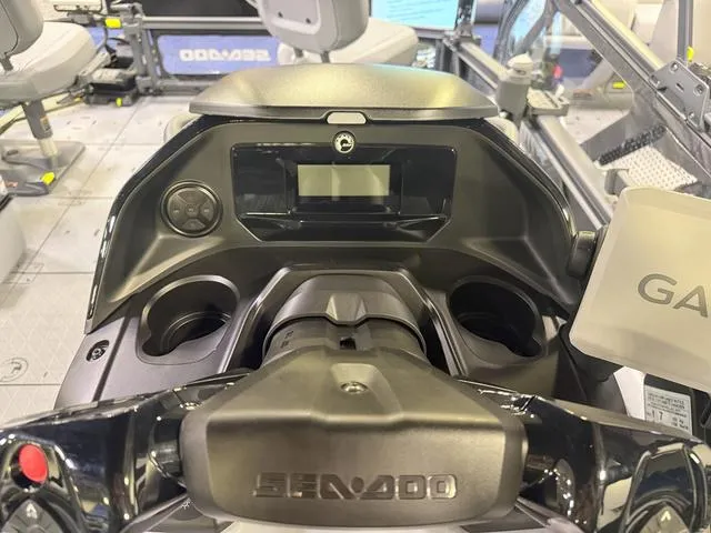 Slide: The Image of 2025 Sea-Doo Switch™ Fish 18 dashboard with controls and display, featuring Garmin integration. - 12