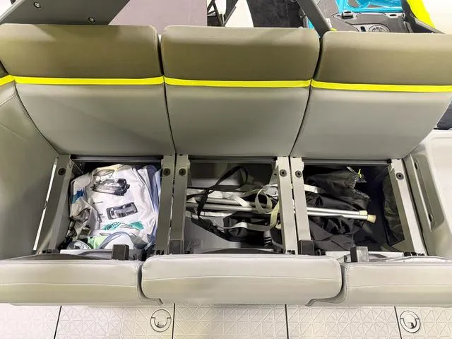 Slide: The Image of 2025 Sea-Doo Switch™ Fish 18 storage compartments with fishing gear and accessories. - 16