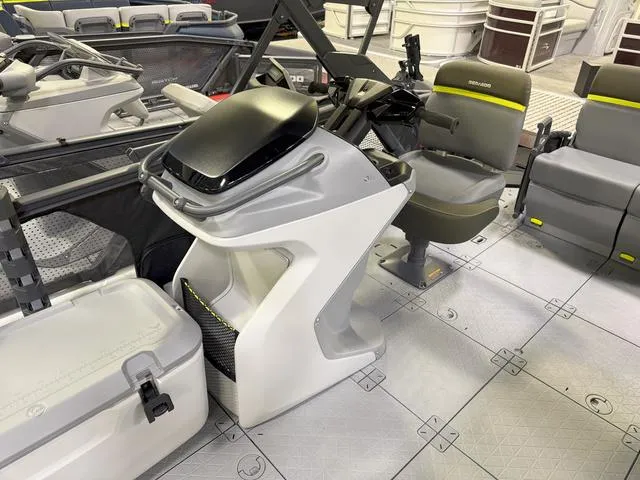 Slide: The Image of 2025 Sea-Doo Switch™ Fish 18 interior with modern seating and control console. - 7