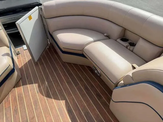 Slide: The Image of Luxurious seating on 2016 South Bay 523FCR 2.75 pontoon boat with wood-style flooring. - 7