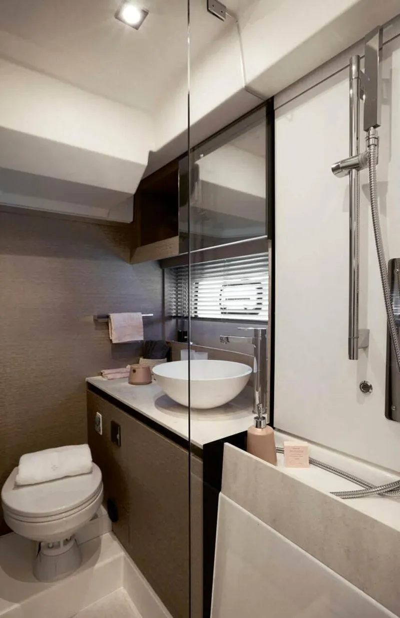 Slide: The Image of Luxurious bathroom in 2024 Prestige 420 Fly yacht, featuring modern fixtures and elegant design. - 10