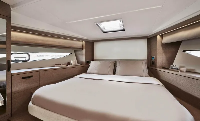 Slide: The Image of Luxurious bedroom interior of 2024 Prestige 420 Fly yacht, featuring modern design and elegant furnishings. - 9