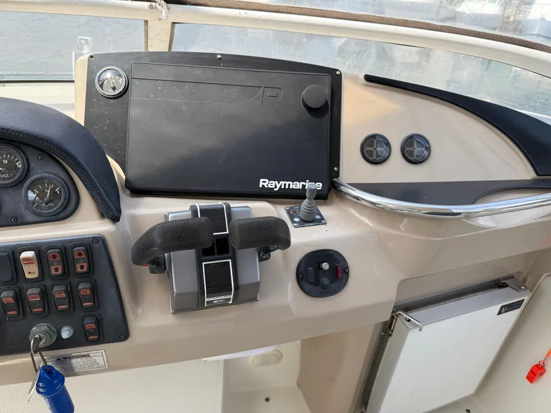 Slide: The Image of Control panel of a 2005 Carver 41 Cockpit Motor Yacht with Raymarine navigation system. - 15