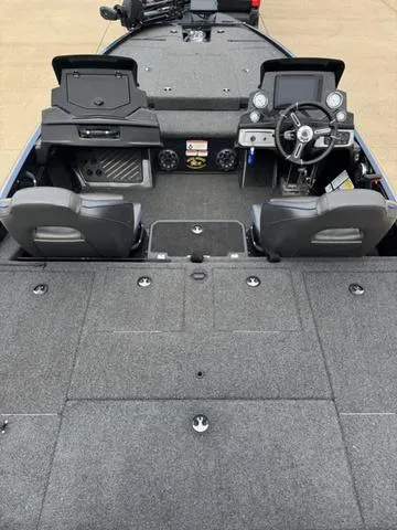 Slide: The Image of 2021 Tracker Nitro Z19 boat interior with dual seats and control panel. - 14