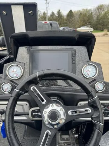 Slide: The Image of 2021 Tracker Nitro Z19 dashboard with steering wheel and gauges. - 5