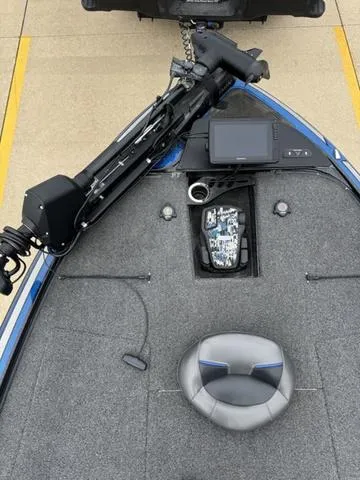 Slide: The Image of 2021 Tracker Nitro Z19 boat deck with fishing equipment and seating. - 9