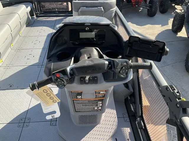 Slide: The Image of 2024 Sea-Doo Switch® Cruise 21 dashboard with controls and seating area. - 12