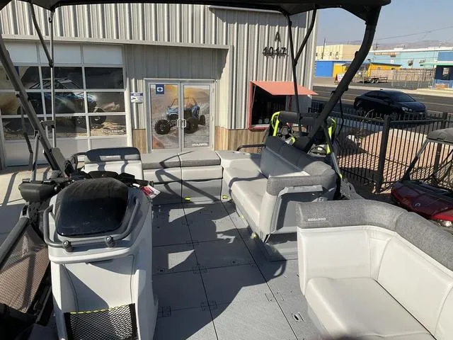 Slide: The Image of 2024 Sea-Doo Switch® Cruise 21 - 230 hp pontoon boat with spacious seating and modern design. - 9