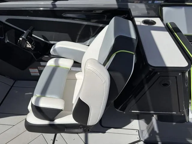 Slide: The Image of 2021 Yamaha Boats 255XD interior with modern seating and sleek design. - 12