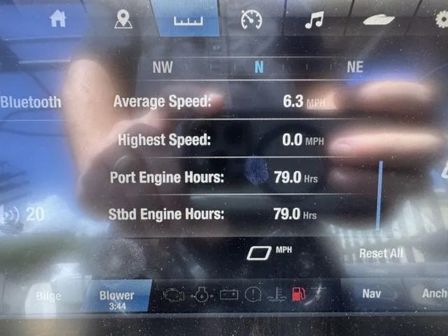 Slide: The Image of Display screen of a 2021 Yamaha Boats 255XD showing speed and engine hours. - 18