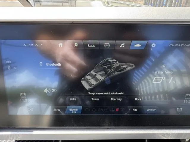 Slide: The Image of Touchscreen display of a 2021 Yamaha Boats 255XD, showing boat controls and Bluetooth connectivity. - 21