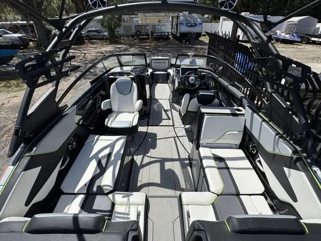 Slide: The Image of 2021 Yamaha Boats 255XD interior with modern seating and sleek design. - 3