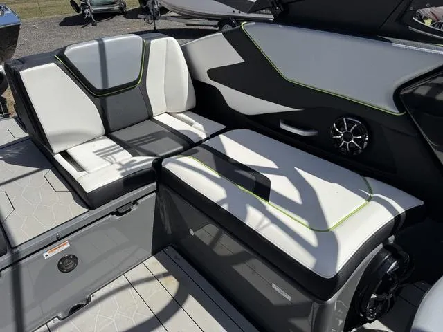 Slide: The Image of 2021 Yamaha Boats 255XD interior seating with modern design and speaker system. - 31