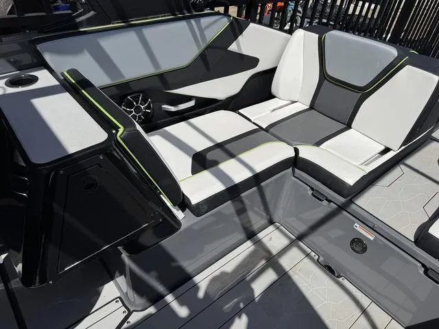 Slide: The Image of 2021 Yamaha Boats 255XD interior with sleek seating and modern design. - 32