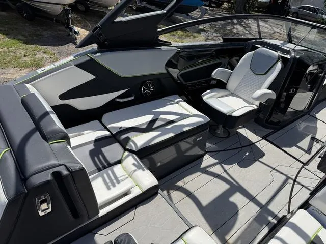 Slide: The Image of 2021 Yamaha Boats 255XD interior with sleek seating and modern design. - 4