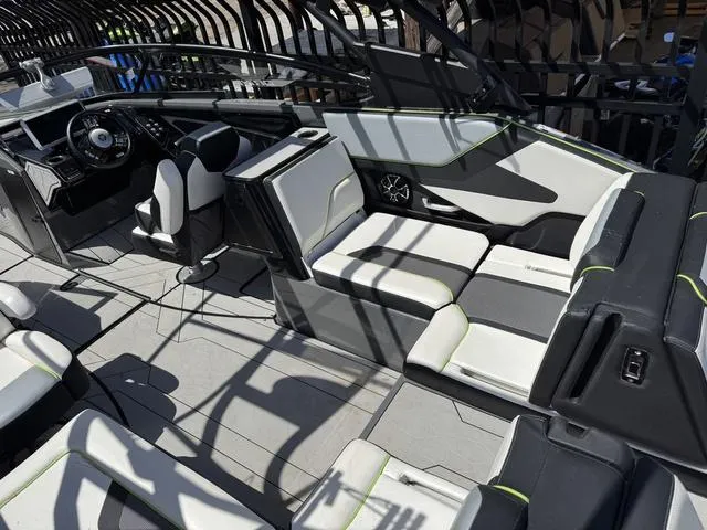 Slide: The Image of 2021 Yamaha Boats 255XD interior with modern seating and sleek design. - 5