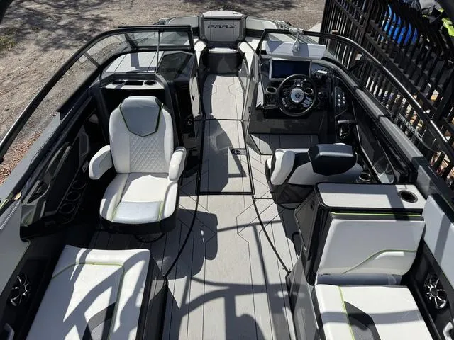 Slide: The Image of 2021 Yamaha Boats 255XD interior with modern seating and advanced dashboard controls. - 6