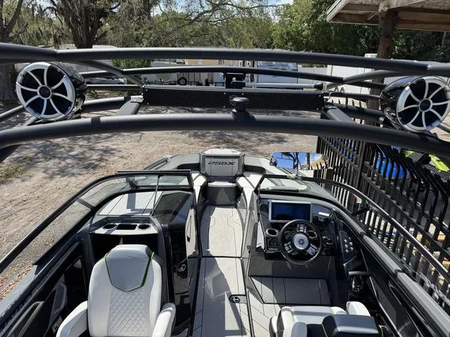 Slide: The Image of 2021 Yamaha Boats 255XD interior with sleek design, advanced controls, and premium seating. - 8