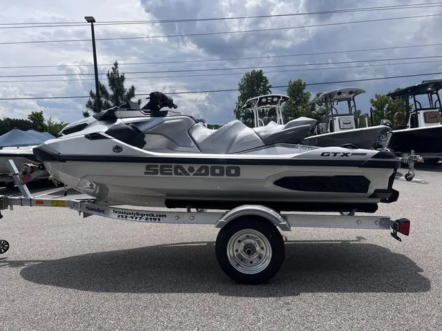 Slide: The Image of 2025 Sea-Doo Waverunner GTX LTD 325 with sound system, sleek design, silver and black. - 3