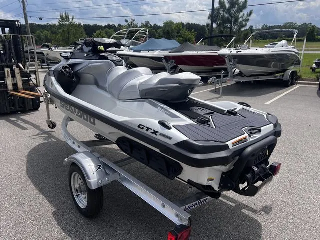 Slide: The Image of 2025 Sea-Doo Waverunner GTX LTD 325 with sound system on trailer. - 6