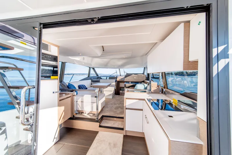 Slide: The Image of Luxurious interior of 2024 Prestige 460 Fly yacht with modern design and panoramic windows. - 5