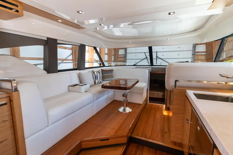 Slide: The Image of Luxurious interior of 2023 Tiara Yachts C44 Coupe with elegant seating and modern design. - 16