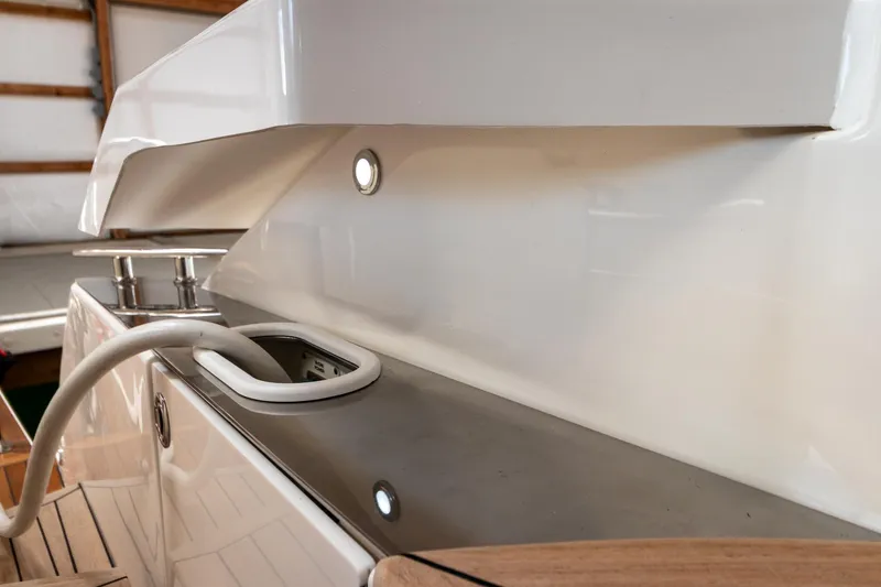 Slide: The Image of 2023 Tiara Yachts C44 Coupe, sleek exterior detail with modern design elements. - 40