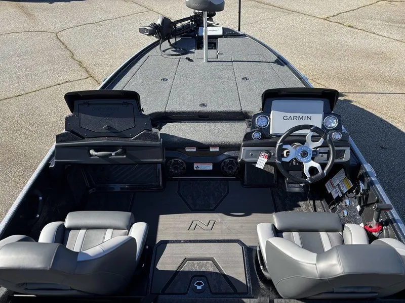 Slide: The Image of 2025 Nitro Z20 XL Pro boat interior with Garmin navigation system and dual seating. - 10