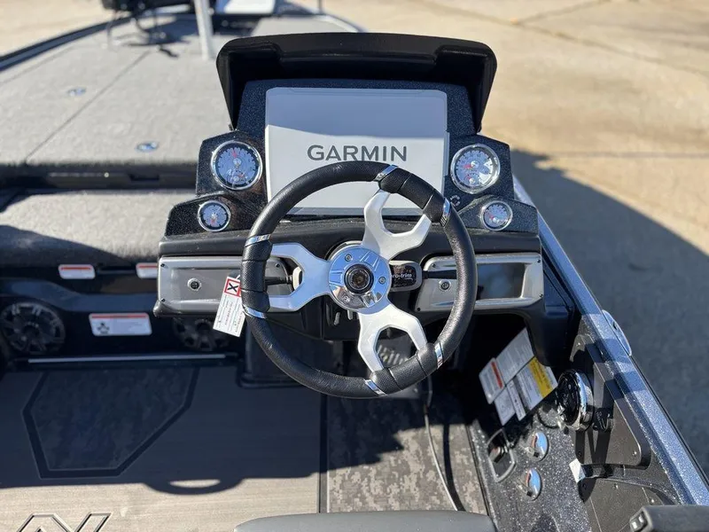 Slide: The Image of Steering wheel and dashboard of 2025 Nitro Z20 XL Pro boat with Garmin display. - 12