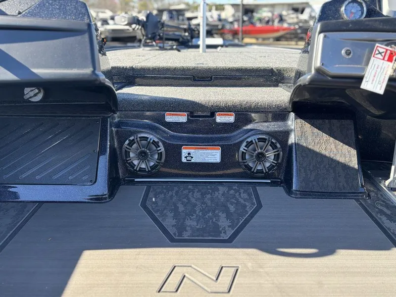 Slide: The Image of 2025 Nitro Z20 XL Pro boat interior with speakers and textured flooring. - 14