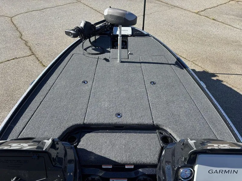 Slide: The Image of 2025 Nitro Z20 XL Pro boat deck with Garmin electronics and trolling motor. - 17