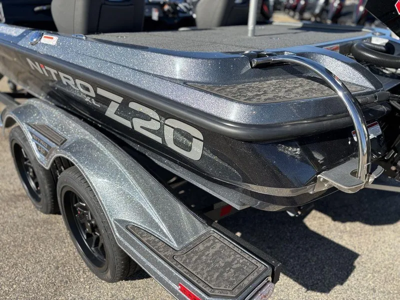 Slide: The Image of 2025 Nitro Z20 XL Pro boat on a trailer, showcasing sleek design and metallic finish. - 22