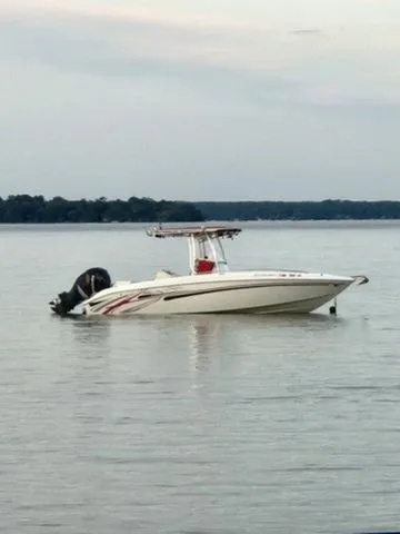 Slide: The Image of 2005 Baja 250 Sportfish Center Console boat on calm water. - 19