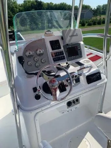 Slide: The Image of 2005 Baja 250 Sportfish Center Console dashboard with Garmin navigation system. - 2